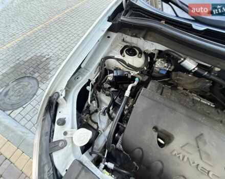 Белый Мицубиси Аутлендер, объемом двигателя 2.36 л и пробегом 140 тыс. км за 12999 $, фото 53 на Automoto.ua