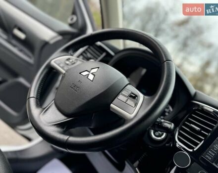 Белый Мицубиси Аутлендер, объемом двигателя 2 л и пробегом 210 тыс. км за 14300 $, фото 51 на Automoto.ua