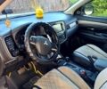 Білий Міцубісі Аутлендер, об'ємом двигуна 2.3 л та пробігом 258 тис. км за 14000 $, фото 4 на Automoto.ua