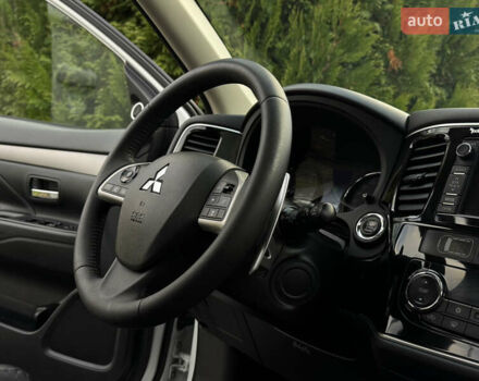 Белый Мицубиси Аутлендер, объемом двигателя 2.3 л и пробегом 214 тыс. км за 15499 $, фото 125 на Automoto.ua