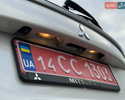 Белый Мицубиси Аутлендер, объемом двигателя 2.3 л и пробегом 214 тыс. км за 15499 $, фото 71 на Automoto.ua