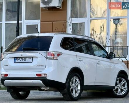Белый Мицубиси Аутлендер, объемом двигателя 2.36 л и пробегом 140 тыс. км за 12999 $, фото 10 на Automoto.ua