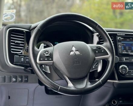 Белый Мицубиси Аутлендер, объемом двигателя 2 л и пробегом 210 тыс. км за 14300 $, фото 56 на Automoto.ua