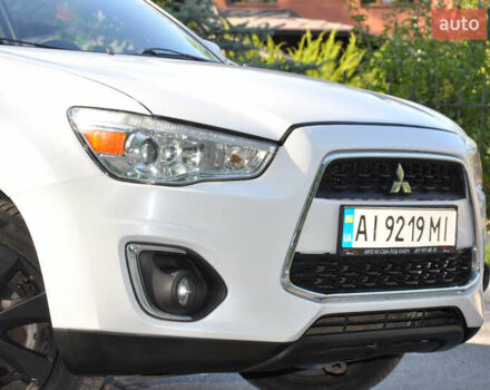 Белый Мицубиси Аутлендер, объемом двигателя 2 л и пробегом 132 тыс. км за 11500 $, фото 31 на Automoto.ua