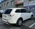 Белый Мицубиси Аутлендер, объемом двигателя 2.4 л и пробегом 120 тыс. км за 13500 $, фото 1 на Automoto.ua