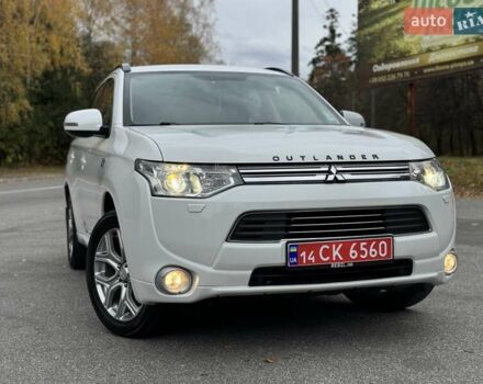 Белый Мицубиси Аутлендер, объемом двигателя 2 л и пробегом 210 тыс. км за 14300 $, фото 6 на Automoto.ua