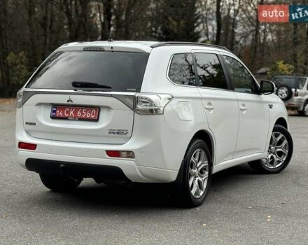 Белый Мицубиси Аутлендер, объемом двигателя 2 л и пробегом 210 тыс. км за 14300 $, фото 28 на Automoto.ua