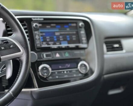 Белый Мицубиси Аутлендер, объемом двигателя 2 л и пробегом 210 тыс. км за 14300 $, фото 53 на Automoto.ua