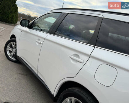 Белый Мицубиси Аутлендер, объемом двигателя 2.3 л и пробегом 214 тыс. км за 15499 $, фото 77 на Automoto.ua