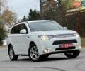 Белый Мицубиси Аутлендер, объемом двигателя 2 л и пробегом 210 тыс. км за 14300 $, фото 3 на Automoto.ua