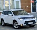 Белый Мицубиси Аутлендер, объемом двигателя 2.36 л и пробегом 140 тыс. км за 12999 $, фото 16 на Automoto.ua