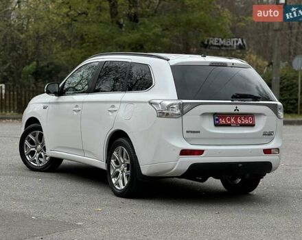 Белый Мицубиси Аутлендер, объемом двигателя 2 л и пробегом 210 тыс. км за 14300 $, фото 24 на Automoto.ua