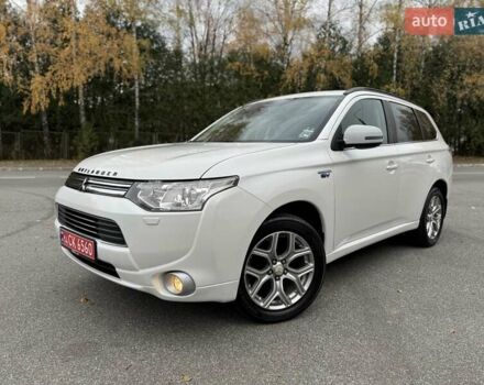 Белый Мицубиси Аутлендер, объемом двигателя 2 л и пробегом 210 тыс. км за 14300 $, фото 18 на Automoto.ua