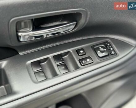 Белый Мицубиси Аутлендер, объемом двигателя 2 л и пробегом 210 тыс. км за 14300 $, фото 55 на Automoto.ua