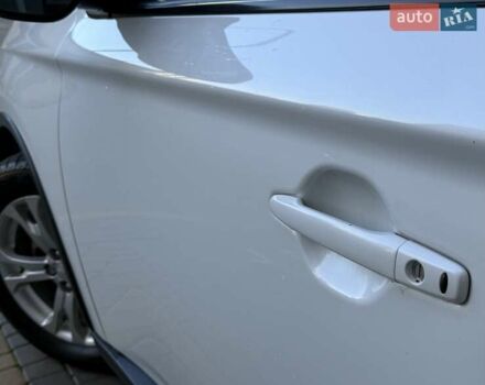 Белый Мицубиси Аутлендер, объемом двигателя 2.36 л и пробегом 140 тыс. км за 12999 $, фото 21 на Automoto.ua