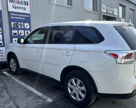 Белый Мицубиси Аутлендер, объемом двигателя 2.4 л и пробегом 120 тыс. км за 13500 $, фото 2 на Automoto.ua