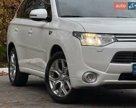 Мицубиси Аутлендер 2014 в Дрогобыче на Automoto.ua Белый Мицубиси Аутлендер, объемом двигателя 2 л и пробегом 228 тыс. км за 15300 $, фото 6 на Automoto.ua