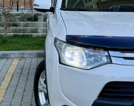 Белый Мицубиси Аутлендер, объемом двигателя 2.36 л и пробегом 140 тыс. км за 12999 $, фото 12 на Automoto.ua