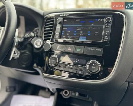 Белый Мицубиси Аутлендер, объемом двигателя 2 л и пробегом 210 тыс. км за 14300 $, фото 46 на Automoto.ua