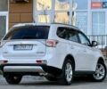 Белый Мицубиси Аутлендер, объемом двигателя 2.36 л и пробегом 140 тыс. км за 12999 $, фото 1 на Automoto.ua