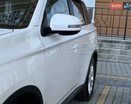 Белый Мицубиси Аутлендер, объемом двигателя 2.36 л и пробегом 140 тыс. км за 12999 $, фото 20 на Automoto.ua