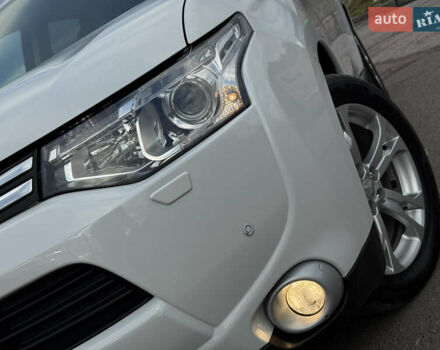 Белый Мицубиси Аутлендер, объемом двигателя 2.3 л и пробегом 214 тыс. км за 15499 $, фото 32 на Automoto.ua