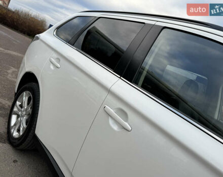 Белый Мицубиси Аутлендер, объемом двигателя 2.3 л и пробегом 214 тыс. км за 15499 $, фото 19 на Automoto.ua