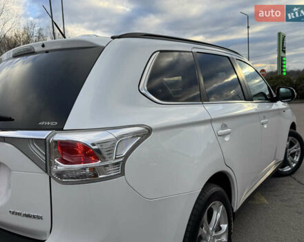 Белый Мицубиси Аутлендер, объемом двигателя 2.3 л и пробегом 214 тыс. км за 15499 $, фото 58 на Automoto.ua