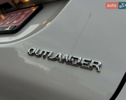 Белый Мицубиси Аутлендер, объемом двигателя 2.3 л и пробегом 214 тыс. км за 15499 $, фото 56 на Automoto.ua