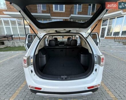 Белый Мицубиси Аутлендер, объемом двигателя 2.36 л и пробегом 140 тыс. км за 12999 $, фото 29 на Automoto.ua