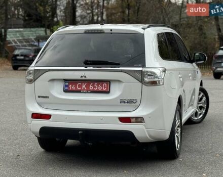Белый Мицубиси Аутлендер, объемом двигателя 2 л и пробегом 210 тыс. км за 14300 $, фото 33 на Automoto.ua
