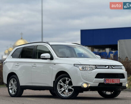 Белый Мицубиси Аутлендер, объемом двигателя 2.3 л и пробегом 214 тыс. км за 15499 $, фото 3 на Automoto.ua