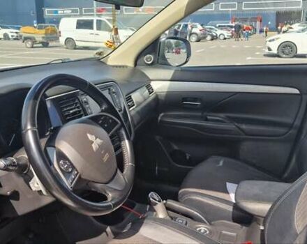 Белый Мицубиси Аутлендер, объемом двигателя 2 л и пробегом 299 тыс. км за 13999 $, фото 11 на Automoto.ua