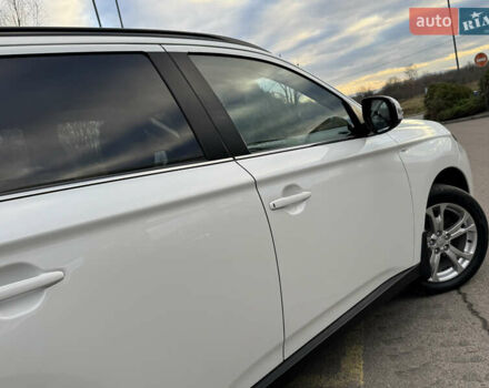 Белый Мицубиси Аутлендер, объемом двигателя 2.3 л и пробегом 214 тыс. км за 15499 $, фото 60 на Automoto.ua