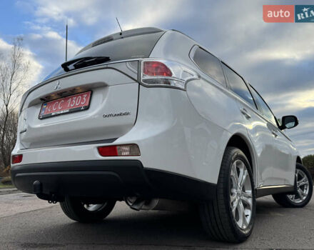 Белый Мицубиси Аутлендер, объемом двигателя 2.3 л и пробегом 214 тыс. км за 15499 $, фото 57 на Automoto.ua