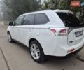 Белый Мицубиси Аутлендер, объемом двигателя 3 л и пробегом 173 тыс. км за 12700 $, фото 2 на Automoto.ua