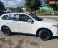 Белый Мицубиси Аутлендер, объемом двигателя 2 л и пробегом 225 тыс. км за 12500 $, фото 6 на Automoto.ua
