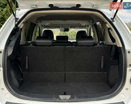 Белый Мицубиси Аутлендер, объемом двигателя 2.3 л и пробегом 214 тыс. км за 15499 $, фото 146 на Automoto.ua