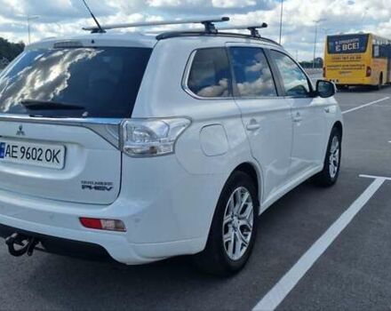 Белый Мицубиси Аутлендер, объемом двигателя 2 л и пробегом 299 тыс. км за 13999 $, фото 4 на Automoto.ua