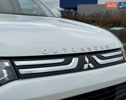 Белый Мицубиси Аутлендер, объемом двигателя 2.3 л и пробегом 214 тыс. км за 15499 $, фото 8 на Automoto.ua