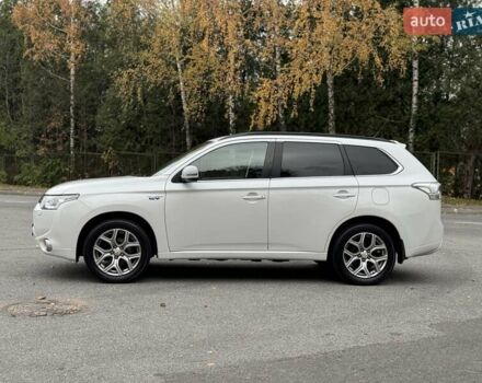 Белый Мицубиси Аутлендер, объемом двигателя 2 л и пробегом 210 тыс. км за 14300 $, фото 17 на Automoto.ua