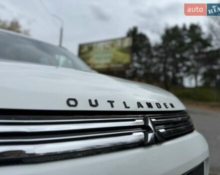 Белый Мицубиси Аутлендер, объемом двигателя 2 л и пробегом 210 тыс. км за 14300 $, фото 7 на Automoto.ua