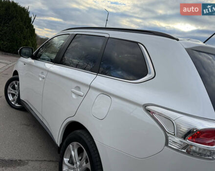 Белый Мицубиси Аутлендер, объемом двигателя 2.3 л и пробегом 214 тыс. км за 15499 $, фото 76 на Automoto.ua