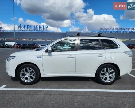 Белый Мицубиси Аутлендер, объемом двигателя 2 л и пробегом 299 тыс. км за 13999 $, фото 7 на Automoto.ua