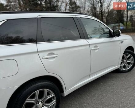 Белый Мицубиси Аутлендер, объемом двигателя 2 л и пробегом 210 тыс. км за 14300 $, фото 29 на Automoto.ua