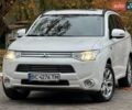 Мицубиси Аутлендер 2014 в Дрогобыче на Automoto.ua Белый Мицубиси Аутлендер, объемом двигателя 2 л и пробегом 228 тыс. км за 15300 $, фото 3 на Automoto.ua