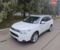 Белый Мицубиси Аутлендер, объемом двигателя 3 л и пробегом 173 тыс. км за 12700 $, фото 1 на Automoto.ua