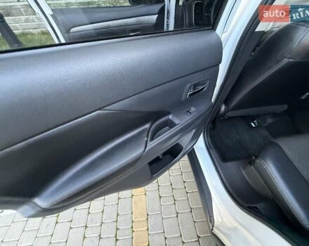 Белый Мицубиси Аутлендер, объемом двигателя 2.36 л и пробегом 140 тыс. км за 12999 $, фото 36 на Automoto.ua