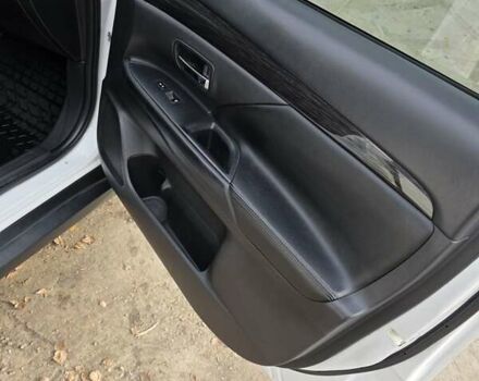 Белый Мицубиси Аутлендер, объемом двигателя 2.36 л и пробегом 169 тыс. км за 13300 $, фото 11 на Automoto.ua