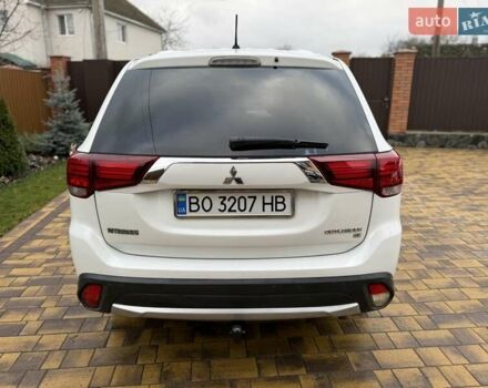 Белый Мицубиси Аутлендер, объемом двигателя 2.36 л и пробегом 191 тыс. км за 13950 $, фото 10 на Automoto.ua